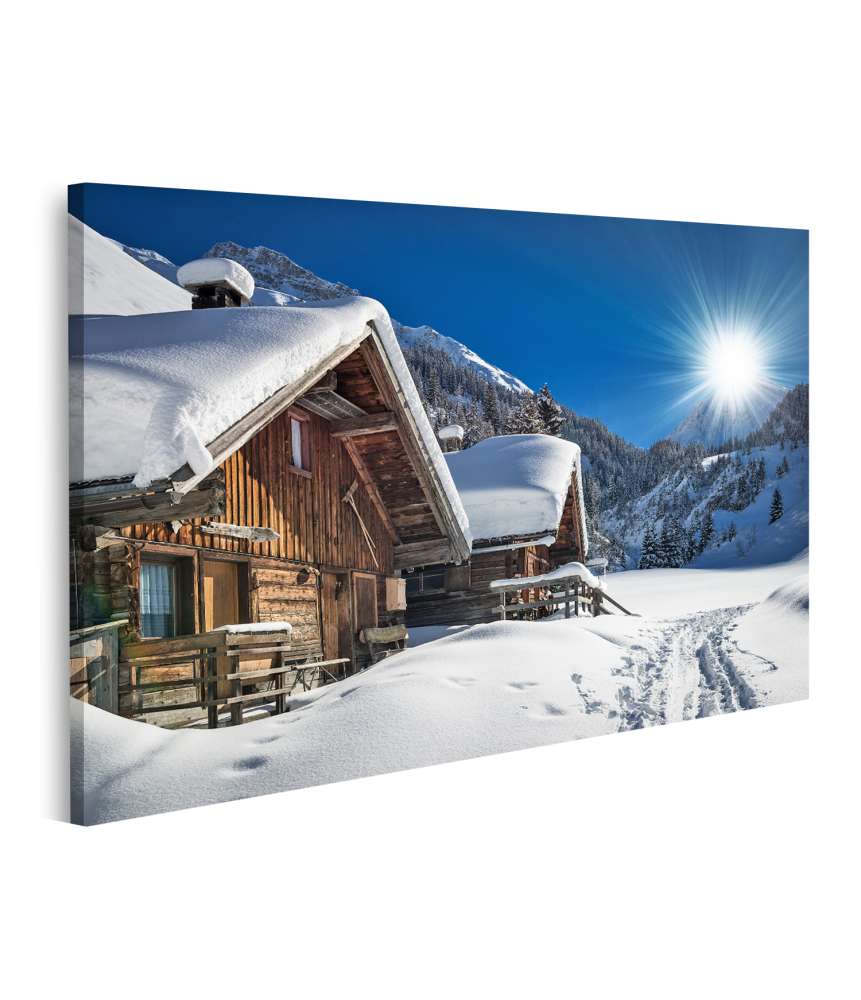 Islandburner Bild auf Leinwand Winterliches Skichalet und Hütte in schneebedecktem Bergpanorama