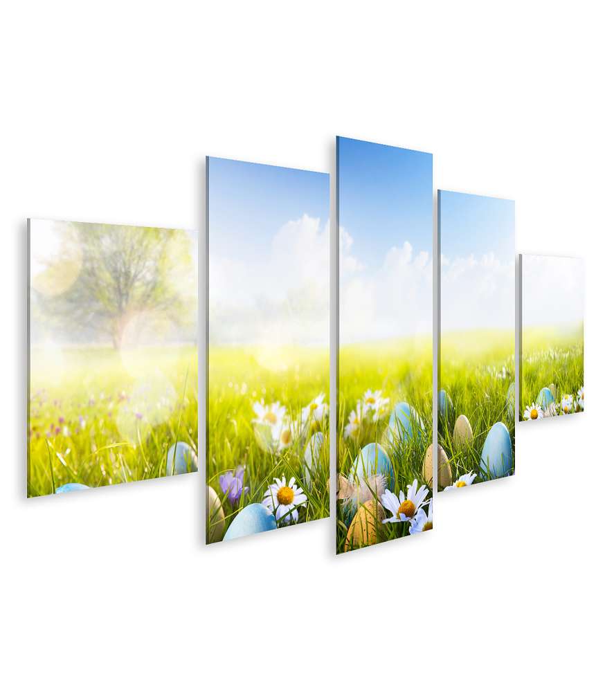 Islandburner Bild auf Leinwand Vibrantes Wandbild von bunt bemalten Ostereiern und Blumen im Gras