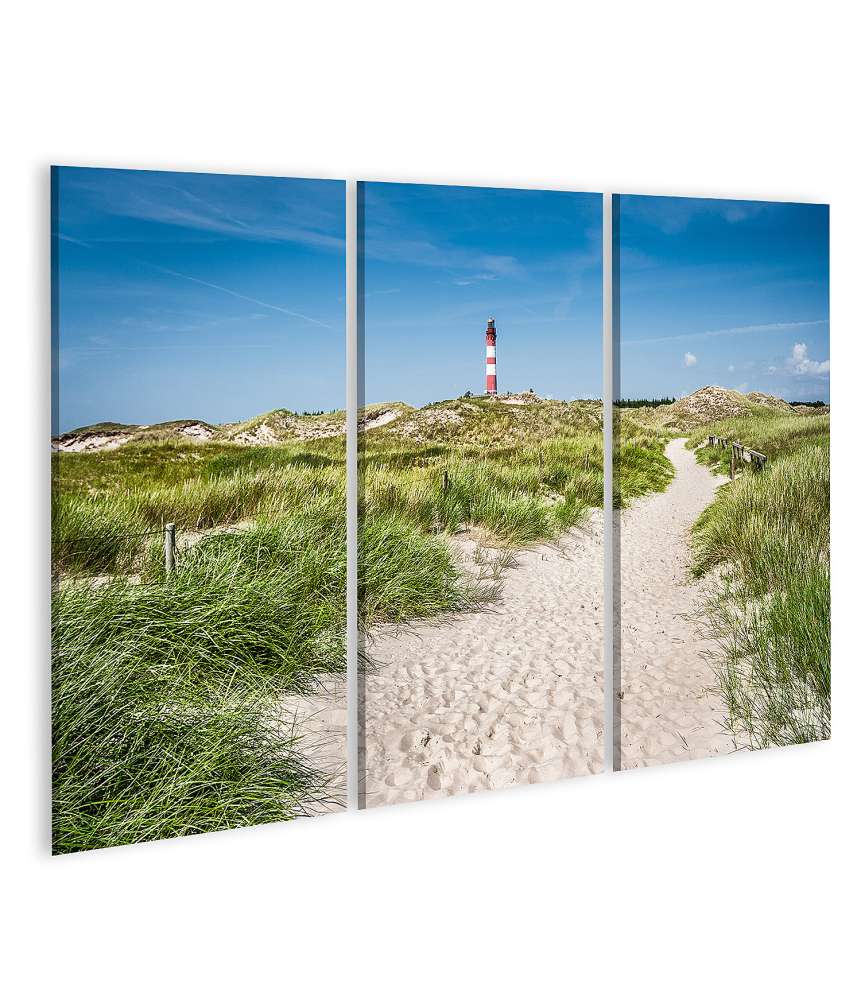 Islandburner Bild auf Leinwand Charmantes Wandbild einer Dünenlandschaft mit Leuchtturm auf Amrum, Nordsee