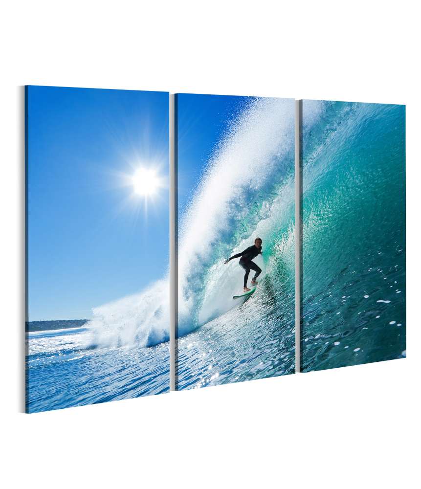 Islandburner Bild auf Leinwand Surfer Riding a Majestic Blue Ocean Wave