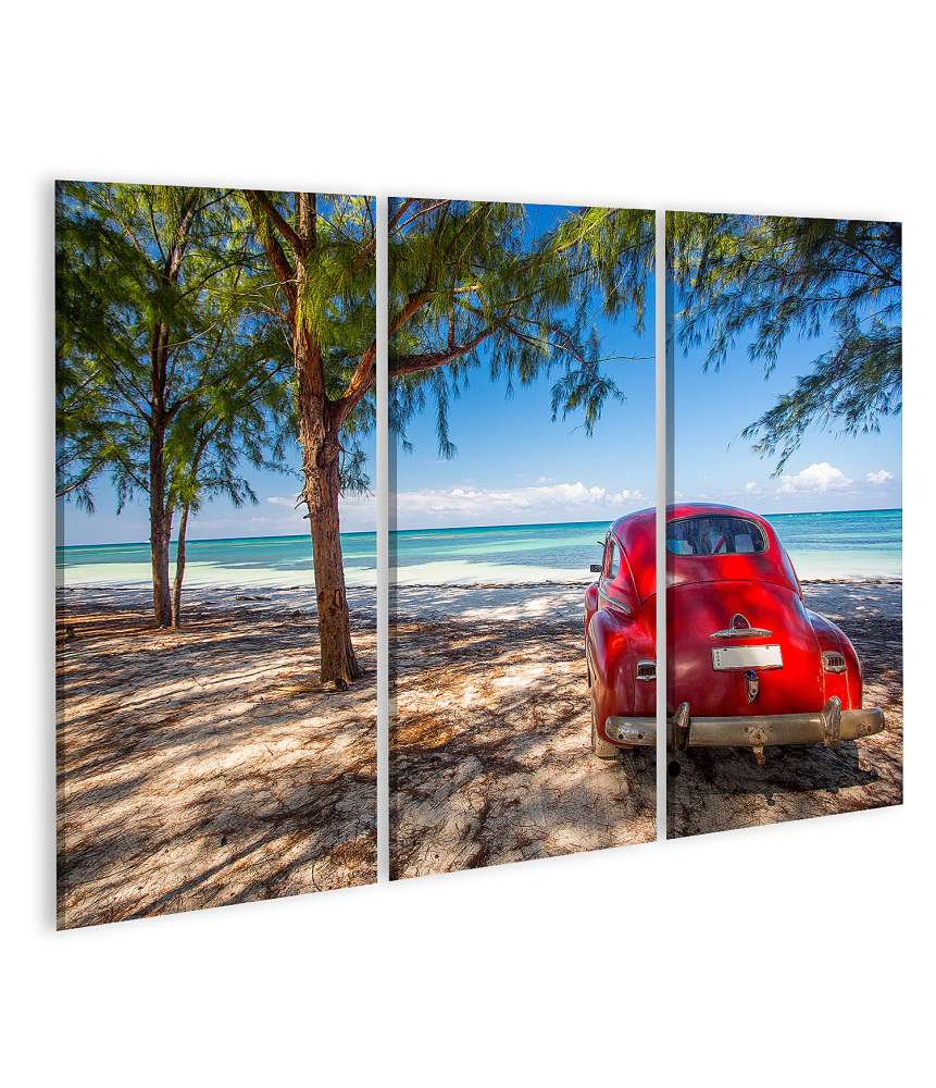 Islandburner Bild auf Leinwand Rotes Oldtimer-Auto am Strand in Kuba als Wandbild