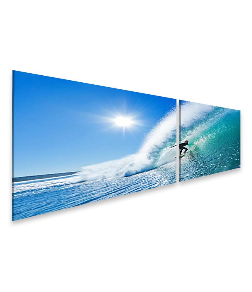 Islandburner Bild auf Leinwand Surfer Riding a Majestic Blue Ocean Wave