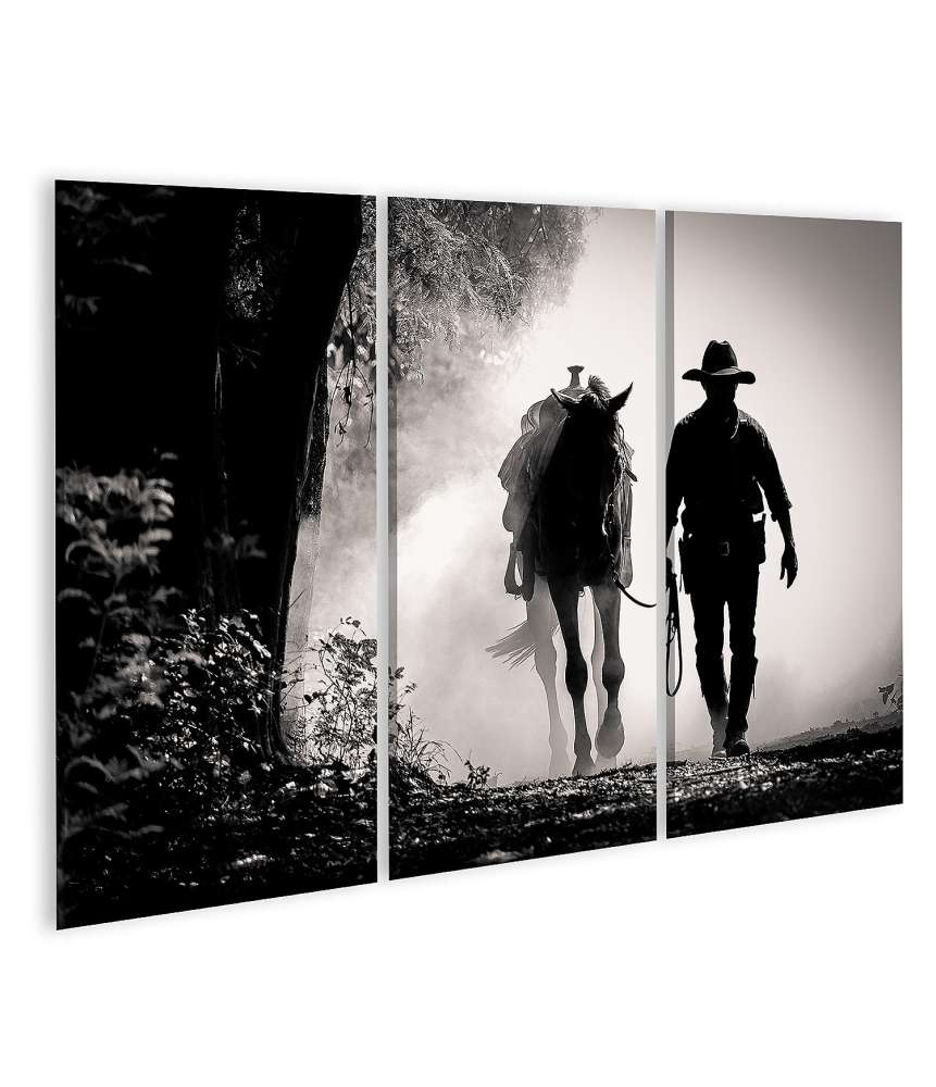 Islandburner Bild auf Leinwand Schwarz-Weiß-Silhouette eines Cowboys auf einem Pferd beim Sonnenaufgang