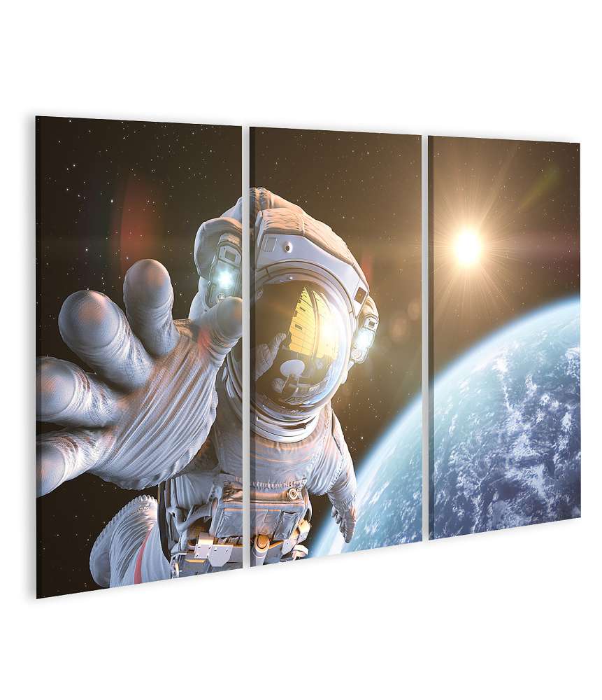 Islandburner Bild auf Leinwand Astronaut im Weltraum mit Blick auf Planet Erde und strahlende Sonne