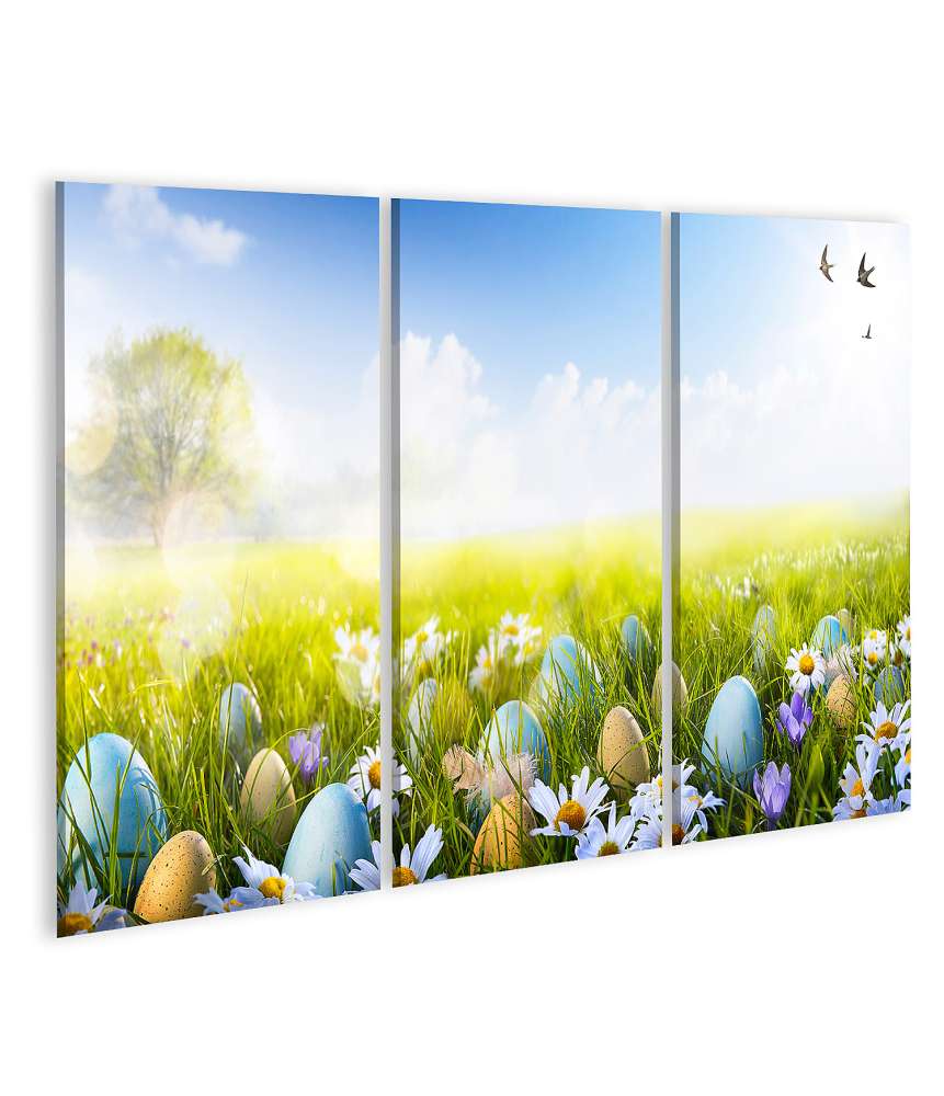 Islandburner Bild auf Leinwand Vibrantes Wandbild von bunt bemalten Ostereiern und Blumen im Gras