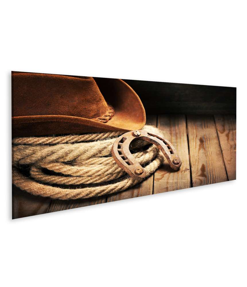 Islandburner Bild auf Leinwand Cowboyhut, Hufeisen und Seil kunstvoll auf einem Holzboden dargestellt