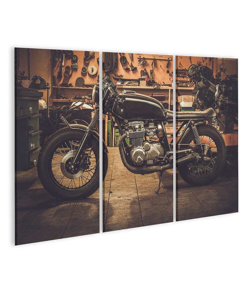 Islandburner Bild auf Leinwand Vintage-Stil Cafe Racer Motorrad in einer nostalgischen Garage dargestellt