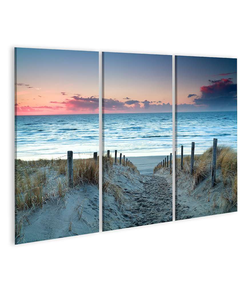 Islandburner Bild auf Leinwand Sonnenuntergang über dem Sandstrand der Nordsee in Holland als Wandbild