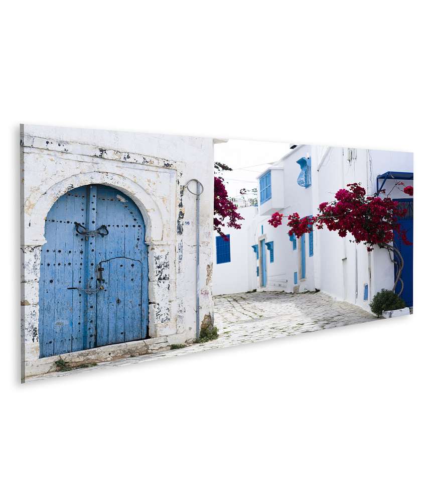 Islandburner Bild auf Leinwand Wandbild von blauen Türen und Fenstern an weißem Gebäude in Sidi Bou Said, Tunesien