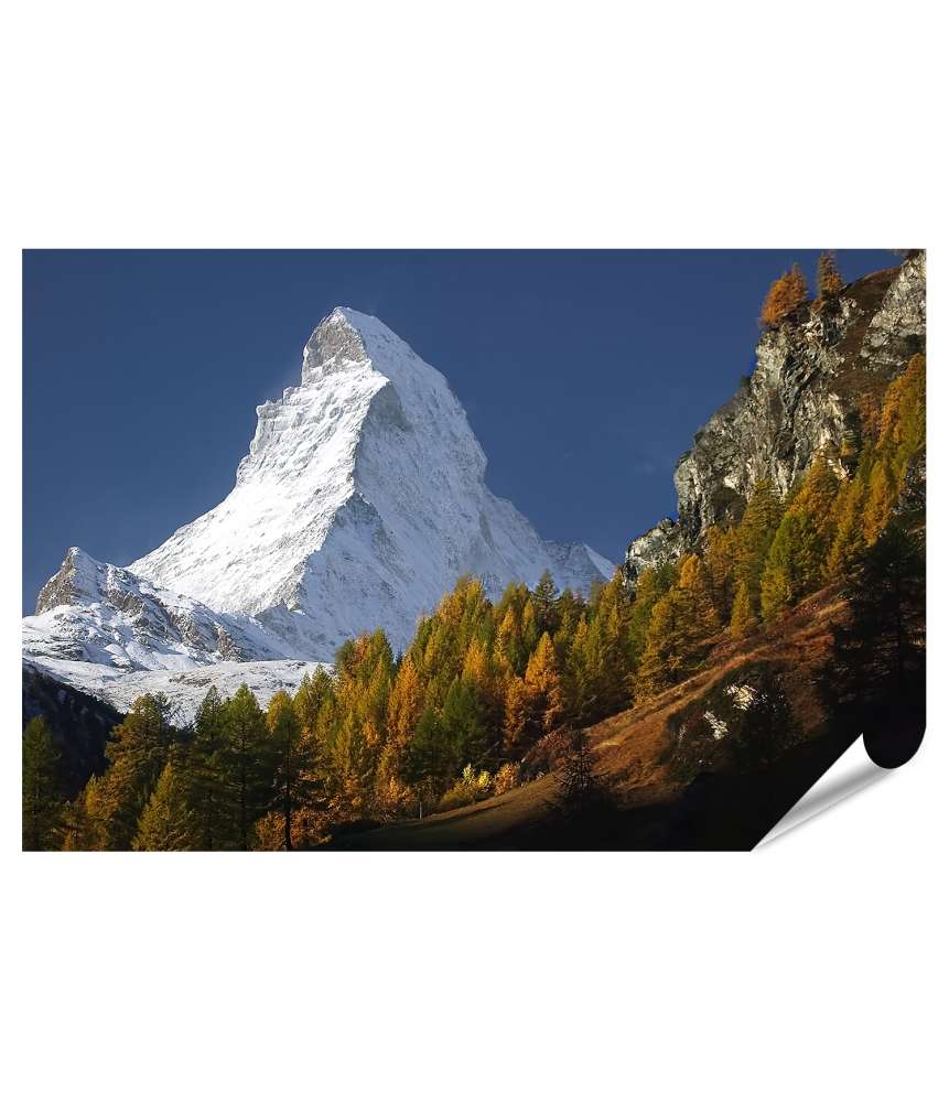 Islandburner XXL Premium Poster Matterhorn mit Schneedecke, umgeben von Wald unter blauem Himmel