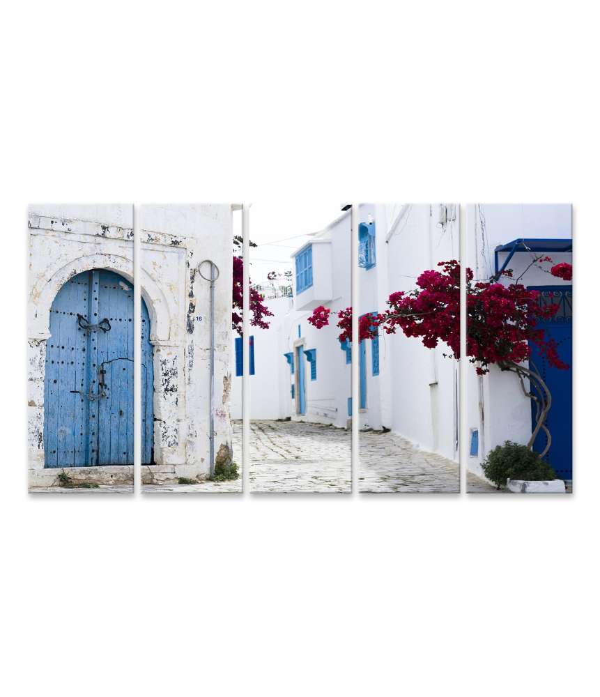 Islandburner Bild auf Leinwand Wandbild von blauen Türen und Fenstern an weißem Gebäude in Sidi Bou Said, Tunesien