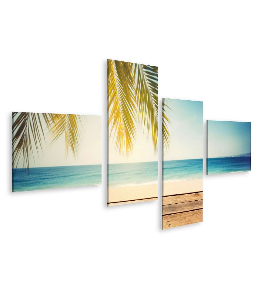 Islandburner Bild auf Leinwand Tropischer Strand mit Sand, blauem Himmel und Palmenblatt auf Holzbrett