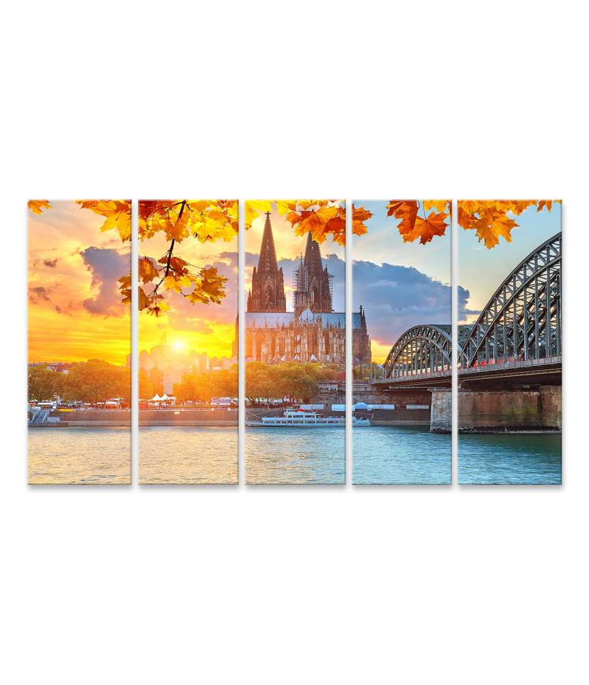 Islandburner Bild auf Leinwand Kölner Skyline bei malerischem Sonnenuntergang als Wandbild