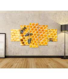 Bild auf Leinwand Fleißige Bienen, die eifrig Honig in ihren Waben herstellen