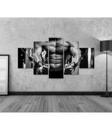 Bild auf Leinwand Nahaufnahme eines Bodybuilders im Fitnessstudio, schwarzweiß Darstellung